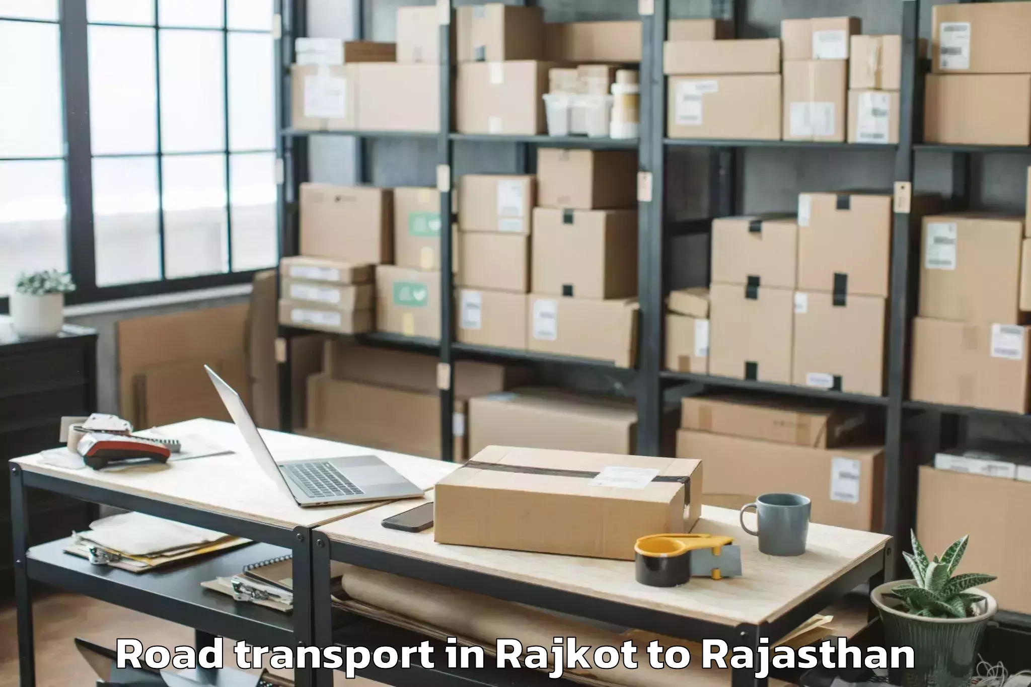 Reliable Rajkot to Opjs University Churu Road Transport